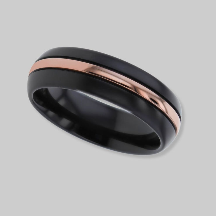 Dome profile Black Zirconium ring with a 1.5mm wide central precious rose gold metal inlay by FANCI Fine Jewellery, Southampton, UK.