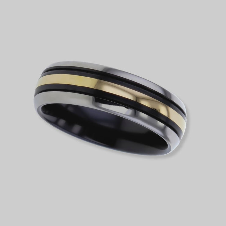 Dome profile Black Zirconium ring with a 1.5mm wide central precious yellow metal inlay by FANCI Fine Jewellery, Southampton, UK.