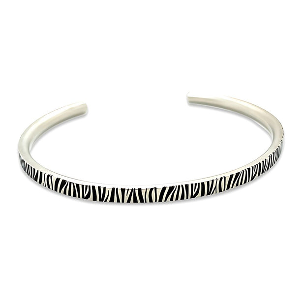 Zebra Print Slim Torc Bangle Manufactured From Hypoallergenic Pure Titanium by FANCI Fine Jewellery, Southampton, UK.