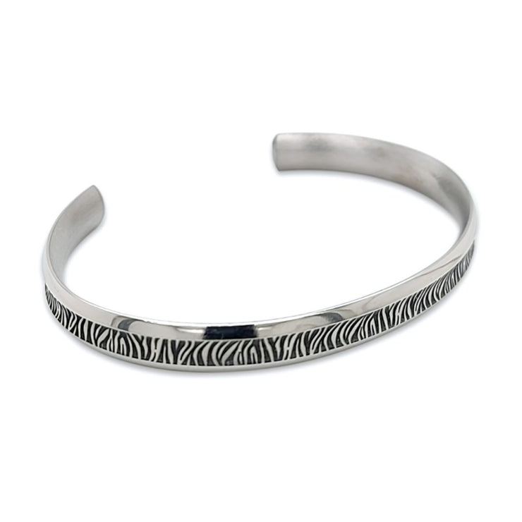 Zebra Print Medium Concave Bangle Manufactured From Hypoallergenic Pure Titanium by FANCI Fine Jewellery, Southampton, UK.