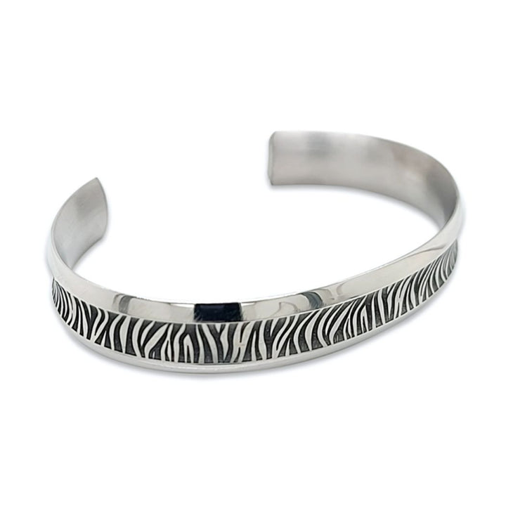 Zebra Print Wide Concave Bangle Manufactured From Hypoallergenic Pure Titanium by FANCI Fine Jewellery, Southampton, UK.