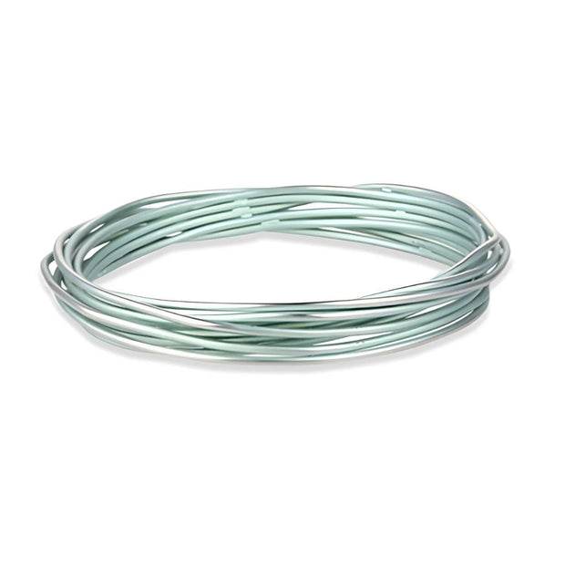 Light Green Colour Chaos Bangle Manufactured From Hypoallergenic Pure Titanium by FANCI Fine Jewellery, Southampton, UK.